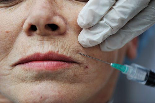 Senior woman getting skin care injection -img-blog