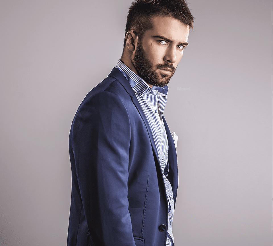 Profile of a fit man in a suit