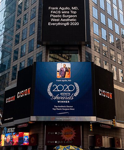 Dr Frank Agullo Wins Top Plastic Surgeon West Aesthetic Everything® 2020 - Billboard sign announcement in Time Square, NYC