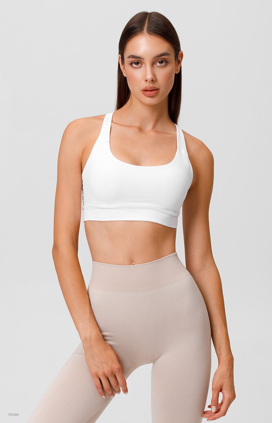 Curvy woman in light workout gear